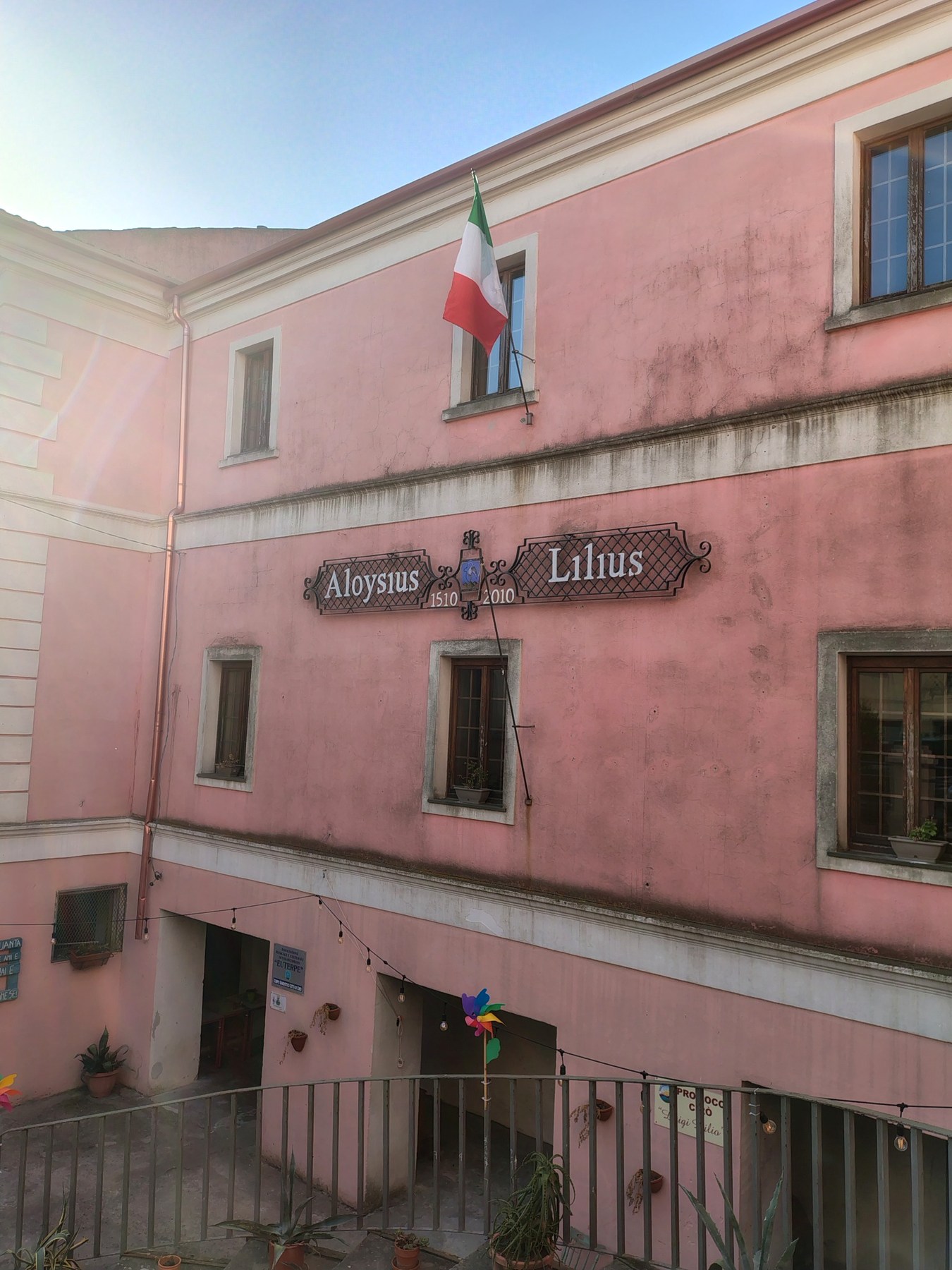 Historic pink façade of the Luigi Lilio Museum in Cirò